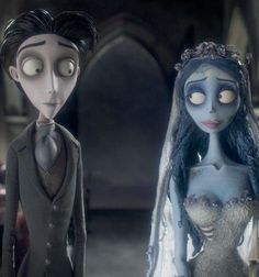 the corpse bride and groom are standing next to each other