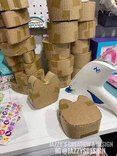 cardboard boxes are stacked on top of each other in the shape of hearts and heart shapes