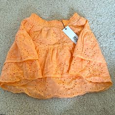 Orange Steve Madden Skirt Never Worn Size Xs Spring Beach Flared Skort, Casual Midi Skort For Spring, Casual Spring Midi Skort, Spring Beach Mini Skirt, Flowy Midi Skort For Summer, Spring Relaxed Fit Midi Skort, Spring Vacation Mini Skirt, Spring Beach Flared Mini Skirt, Short Spring Skirt For Day Out