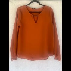 Flowy And Light Forever 21 Blouse With Tag. Size Large But Fits A Little Small. Listed On Tag As Apricot But More Burnt Orange. Includes Nice Metal Embellishments On Sleeve And V-Neck. Trendy Split Neck Fall Blouse, Spring Workwear Split Neck V-neck Top, Spring V-neck Split Neck Top For Work, Spring Split Neck V-neck Top For Work, Split Neck V-neck Top For Spring Workwear, Trendy Split Neck Blouse For Fall, Orange V-neck Blouse For Brunch, Forever 21 V-neck Blouse For Brunch, Forever 21 Casual V-neck Blouse