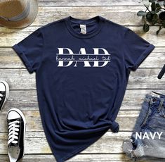 Dad To Be Shirt, Custom Dad Name Shirt, Personalized Dad Tee, Father's Day, New Dad Crewneck, Gift for Him, Christmas Gift, Trendy Dad Shirt HOW TO ORDER: 1. Please, Check and Review all Photos and Size Charts (The V-necks are Women's Size, and the other styles are Unisex) 2. Choose Your T-Shirt Color/Size (You can see youth, toddler and baby options in the same drop-down menu) 3. Choose Your Quantity as much as you want. 4. Click "Add To Cart". For multiple items go back to the listing and repe Custom Text Cotton T-shirt For Birthday, Birthday Cotton T-shirt With Custom Text, Best Dad Ever Shirt, Funny Shirts For Men, Gift For Father, Fathers Day Shirts, Gift For Dad, Dad To Be Shirts, Size Charts