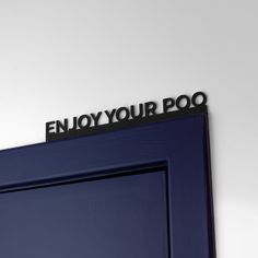 a blue door with the words enjoy your poo on it