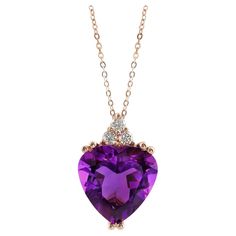 Set with a magnificent Amethyst, here is a lovely 2.55 carat gem that will proclaim your love loud and clear. With its rich aubergine hues, this unrivalled gem has both exceptional color and an eye clear internal appearance. Paired also with diamonds that add to the sparkle this gem boasts, this pendant has been crated in 14K rose gold that brings all the colors together. Chain 18" Details SKU 3589 Metal type 14K Rose Gold Metal Weight 1.90 gr Center Stone Amethyst Side Stones Diamonds Report N/ Loud And Clear, Amethyst Heart, Necklace Amethyst, Heart Necklace Diamond, Rose Gold Pendant, Amethyst Jewelry, Rose Gold Metal, Amethyst Necklace, Yellow Gold Pendants