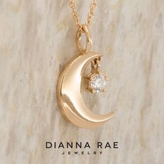 The night sky is forever balanced by the ever changing moon and the always shining stars up above. The Moon and Star Pendant shows this delicate balance between two of the most beautiful cosmic wonders that every human gets to experience. A crescent moon hugs a beautiful sparkling lab grown diamond as if they were dancing through the sky. AVAILABLE DIAMONDS: 0.10 carat Lab-Grown Diamond of SI2 clarity and G-H color or better Choose from 14k yellow, white, or rose gold. Includes an 18" chain. Celestial Moon-shaped Jewelry With Rose Cut Diamonds, Celestial Moon Shaped Jewelry With Rose Cut Diamonds, Celestial Crescent Diamond Jewelry, Elegant Diamond Sun And Moon Jewelry, Elegant Diamond Jewelry With Sun And Moon Design, Celestial Half Moon Jewelry For Anniversary, Celestial Diamond Jewelry With Single Diamond, Celestial Half Moon Wedding Jewelry, Celestial Wedding Jewelry With Single Diamond