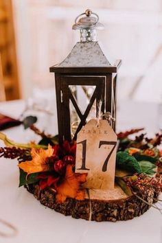 a small lantern is sitting on top of a table