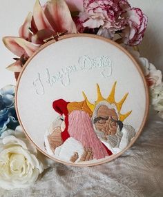 the embroidery is on and it says happy birthday with an image of two elderly men