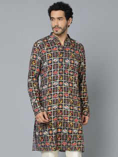 VASTRAMAY Men's Navy Blue Patola Print Ethnic kurta Add a touch of ethnic elegance to your wardrobe with this VASTRAMAY kurta. It features a beautiful navy blue base with a traditional patola print, making it perfect for any special occasion. Features Navy blue color with patola print Mandarin collar Full sleeves Knee length Pockets Specifications Material: Cotton Blend Top Length: Knee Length Sleeve Length: Full Sleeves Material & Care Top Fabric: Cotton Blend Care: Dry Clean Only Legal Disclai Multicolor Printed Motifs Long Sleeve Kurta, Long Sleeve Multicolor Kurta With Printed Motifs, Multicolor Long Sleeve Kurta With Printed Motifs, Long Sleeve Multicolor Printed Motifs Kurta, Festive Multicolor Tunic Kurta, Multicolor Straight Kurta For Eid, Diwali Printed Straight Kurta, Eid Multicolor Straight Kurta, Diwali Puja Kurta With Block Print