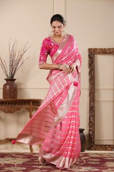 Beautiful powder pink buliyan, cutdana and sequin work organza saree. It comes with a red embroidered saree blouse. Shop designer saris online in USA from Pure Elegance. Disclaimer: The actual product may vary slightly from the image. These are custom orders, hence expect slight variation in color, placement of the motif or buta. ESTIMATED DELIVERYBecause this is a custom order, it would take about 4 weeks from the date of purchase. RETURN POLICYThis product is a custom order and cannot be returned or exchanged. Celebration Cotton Silk Saree With Zari Work, Cotton Silk Pre-draped Saree With Zari Work For Celebration, Celebration Cotton Silk Pre-draped Saree With Zari Work, Transitional Organza Saree With Unstitched Blouse, Pink Cotton Silk Traditional Wear For Festive Season, Pink Cotton Silk Traditional Wear For Transitional Season, Festive Pink Cotton Silk Traditional Wear, Transitional Pink Cotton Silk Traditional Wear, Pink Semi-stitched Traditional Wear In Cotton Silk