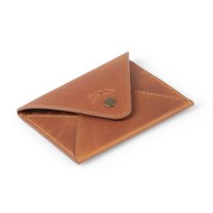 Compact, lightweight, and built to stop scammers in their tracks – the Small Salmon Leather Wallet is the perfect size for all your everyday adventures. Four card slots and a half-bill compartment keep everything conveniently organized. Built-in R.F.I.D. technology blocks scammers from electronically stealing your information. This sophisticated unisex wallet is handcrafted of buttery-soft, beautifully embossed full-grain crazy horse leather – the most durable leather in the world. DIMENSIONS: 4 Envelope Wallet, Crazy Horse, Leather Care, Card Slots, Natural Leather, Leather Handmade, Leather Wallet, Wallet, Leather