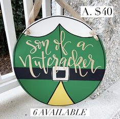 a green and white sign that says son of a nutcracker on it's side