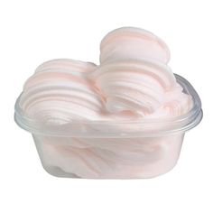 whipped cream in a plastic container on a white background