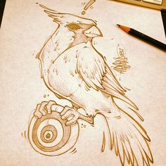 a drawing of a bird sitting on top of a piece of paper next to a pencil