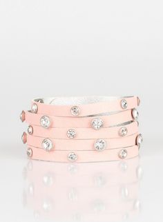 "Rhinestone Reputation" Pink Urban Wrap Bracelet: Dotted with glassy white rhinestones, a thick pink leather band has been spliced into five glittery strands around the wrist for a sassy look. Features an adjustable snap closure. Sold as one individual bracelet. Want it in Blue? Pink Wrap, Turquoise Bead Bracelet, Snap Bracelets, Purple Pearl, Purple Rhinestone, Paparazzi Accessories, Rhinestone Heart, White Rhinestone, Affordable Jewelry