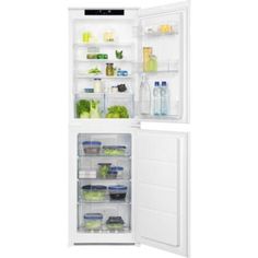 an open refrigerator with the door wide open and food inside it, on a white background