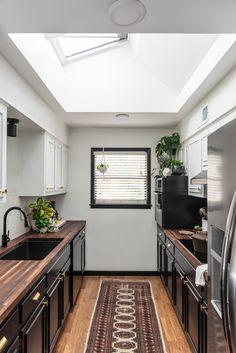 the kitchen is clean and ready for us to use in its new owner's home