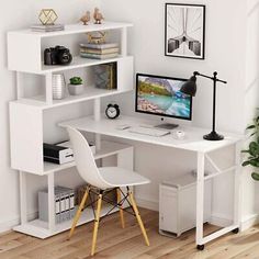 a white desk with a computer on it in front of a plant and bookshelf