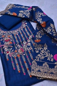 Item Overview ATHARVA Hand Embroidered Salwar Kameez w/Embroidered Neck Dark Blue (Royal Blue)/Colorful Meenakari Banarsi Dupatta/Customized Stitching/Wedding/ CH1545 Fabric: * Shirt: Chanderi Silk -Royal Blue 2.5 Mts, with Beautiful Embroidery Neck * Dupatta:Meenakari Banarsi Dupatta/Colorful Motifs (Motifs May Wary) * Salwar: Santoon Silk 2.5 Mts. Excusive Hand Embroidered Party Wear Punjabi Suit. Customization: * Fabrics Customization: Designs Can be made in different Fabrics. *Color Customiz Banarsi Dupatta, Patiala Salwar Kameez, Embroidered Salwar, Blue Color Combinations, Dark Blue Suit, Embroidered Pants, Patiala Salwar, Punjabi Suit, Punjabi Suits