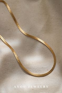 Our herringbone chain necklace is gorgeous, catches light and shimmers perfectly. This gold chain necklace will be your go-to everyday statement jewelry piece that you don’t want to miss on. It can be worn on both casual and fine nights out and this chunky gold necklace will be a great addition to your layered necklace collection. Everyday Gold Plated Herringbone Necklace, Dainty Herringbone Necklace With Box Chain, Dainty Everyday Herringbone Necklace With Box Chain, Everyday Gold Herringbone Necklace In 14k, Dainty Gold Herringbone Necklace With Delicate Chain, Everyday 14k Gold Herringbone Necklace, Gold Herringbone Necklace With Box Chain For Everyday, Gold Herringbone Necklace With Adjustable Chain For Everyday, Chic Gold Herringbone Necklace With Adjustable Chain