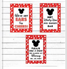 three red and white mickey mouse party signs