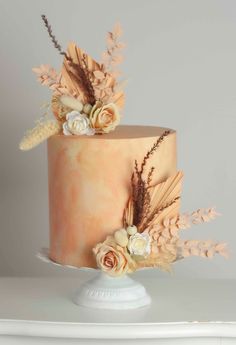 a close up of a cake with flowers on it