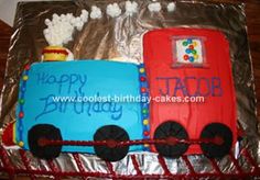 two cakes shaped like trains on tin foil