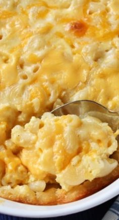 a casserole dish with macaroni and cheese in it, ready to be eaten