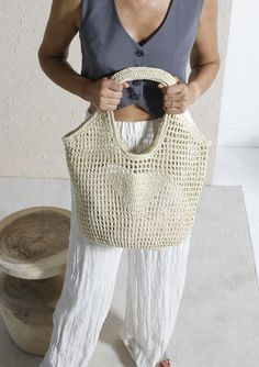 Handmade Raffia Crochet Bag, Natural Beach Tote, Raffia HandBag, Raffia Tote, Straw Beach Bag, Raffia Bag, Crochet Purse Bag, Natural Handbag, Raffia Tote Bag, Hand Knit Beach Bag Features: 30x50cm.  100% Eco-Friendly Paper Raffia Yarn Without Lining Dimensions, 3 colors are available 100% Eco-Friendly Raffia Yarn Brown Raffia Yarn Without Lining & Pocket **Fractions rounded up in inches Please ask for Fast Shipping Care: Do not come into contact with water as the material is natural paper threa Casual Handheld Jute Crochet Bag, Casual Handheld Crochet Jute Bag, Casual Woven Crochet Bag With Top Handle, Cream Top Handle Straw Bag For Beach, Casual Natural Crochet Bag With Top Handle, Natural Handheld Bag For Beach Season, Beach Woven Hobo Bag With Top Handle, Beach Woven Top Handle Hobo Bag, Beige Handheld Crochet Bag For Vacation