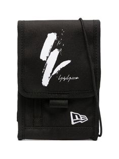 black/white mesh panelling logo print to the front embroidered logo to the front foldover top with touch-strap fastening front zip-fastening pocket main compartment Casual Shoulder Bag With Logo For Daily Use, Functional Black Bag With Logo Print, Functional Bags With Logo Print, Functional Everyday Bags With Logo Print, Functional Logo Print Bag, White Sporty Shoulder Bag For Streetwear, Sporty White Shoulder Bag For Streetwear, Black Bags With Logo Patch For Daily Use, Casual Logo Print Shoulder Bag For Travel