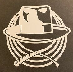 a black and white drawing of a hat with a pipe on it's side