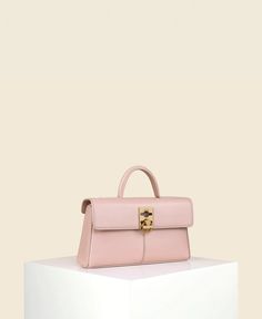 A limited edition for Summer, the Stance Wallet is rendered in Blush. It has a compact, structured silhouette with enough space inside for the essentials. Remove the detachable shoulder strap to carry by the top handle. Pink Leather Box Bag For Office, Timeless Pink Leather Bag, Elegant Pink Box Bag For Evening, Elegant Pink Evening Box Bag, Modern Pink Flap Bag With Detachable Handle, Classic Pink Flap Bag With Top Handle, Classic Pink Top Handle Flap Bag, Pink Evening Box Bag With Detachable Handle, Elegant Pink Handheld Box Bag