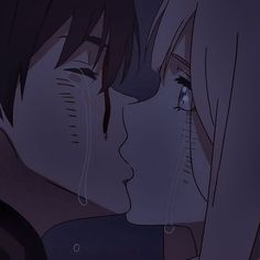 two anime characters kissing each other with tears on their faces