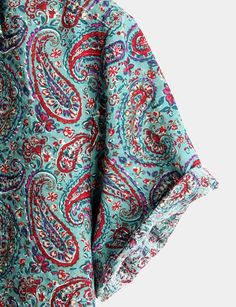 This Paisley Vintage Cotton Retro 70s Shirt is a retro-inspired piece that will make you feel groovy. It has a paisley print that is colorful and funky. It is made of a lightweight fabric that is comfortable. It has a button-front design, a spread collar, and short sleeves. Perfect for summer vacations. Features: 70% Cotton, 30% Viscose Lightweight fabric with great comfort Regular fit Machine wash cold; Tumble dry low; Low iron; No bleach Button-front shirt featuring spread collar and short sleeve Great for summer vacations. Garments, especially those of cotton may see slight shrinkage after washing Size Chart: Cotton Paisley Print Patterned Tops, Casual Multicolor Paisley Print Tops, Bohemian Relaxed Fit Paisley Top, Bohemian Paisley Print Relaxed Fit Top, Bohemian Paisley Print Top With Relaxed Fit, Bohemian Relaxed Fit Paisley Print Top, Hippie Paisley Print Summer Top, Hippie Paisley Print Top For Summer, Summer Hippie Top With Paisley Print