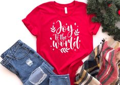 "Joy To The World Shirt | Christmas Tshirt | Women Christmas T-Shirt | Cozy Christmas Gift | Christmas Song Shirts | Cute New Year Tee How To Order: 1 - Please, check and review all photos 2 - Choose your t-shirt size and color *Different styles of shirts may have different shades of same color choice due to different manufacturer brands. *For this reason, we recommend you to match shirts from the same styles if you want precisely matching colors (exa. Unisex, V-neck, Tank top, etc.). 3 - Click Christmas Song Shirts, Mom Tees Funny, Cute Christmas Shirts, Womens Christmas Shirts, Christmas Tree Shirt, Merry Christmas Shirts, Tree Shirt, Comfy Shirts, First Mothers Day