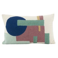 a pillow with an abstract design on the front and back, in pink, green, blue