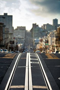 a train track going through the middle of a city