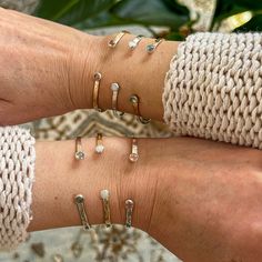 Simple and every day. These dainty cuffs are slighty adjustable. The are measured 6 inches in length with a 1 inch opening. Choice of Milky white opal, Oregon Sunstone or Labradorite. Gems are all set in sterling silver with a choice of 14k gold filled or sterling silver band. All of my work is hand crafted, from sourcing the stones from sustainable miners and lapidary artist, to forging the piece from sterling and fine silver sheet metal and wire. Over time, sterling silver develops a lovely pa Dainty Adjustable Stackable Cuff Bracelet, Gemstone Cuff Bracelet, White Opal, Sterling Silver Bands, Gemstone Bracelets, Fine Silver, Silver Band, Earring Necklace, Labradorite