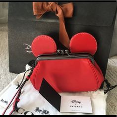 A Must-Have For Every Disney Lover! Limited Addition Disney X Coach 1941. Nwt. Made Of Smooth Glove Tanned Leather. Kiss-Locking Frame With Fabric Lining. Wrist Strap Attached. Approximately 7.75”(L), 4.25”(H), 3.25”(D). Red Coach Clutch Bag, Red Minnie Mouse Bags, Coach Red Wristlet With Zipper Pouch, Red Coach Wristlet For Daily Use, Coach Mickey Mouse, Red Coach Wristlet With Zipper Closure, Coach Clutch, Pink Wristlet, Coach 1941