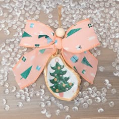 a decorated christmas ornament with a bow on it