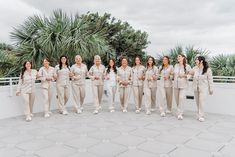 a group of women standing next to each other