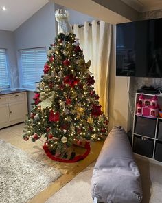 a decorated christmas tree in a living room