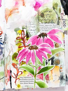 an art journal with watercolors and ink on paper, featuring pink flowers in the middle