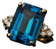 9.85 Carats Natural Impressive London Blue Topaz and Diamond 14K Yellow Gold Ring Suggested Replacement Value $6,700.00 Total Natural London Blue Topaz Weight: 9.50 Carats (VVS) London Blue Topaz Measures: 14 x 10mm Natural Round Diamonds Weight: .35 Carats (color F-G / Clarity VS2) Ring total weight: 7 grams Disclaimer: all weights, measurements and colors are approximate and may vary slightly from the listed dimensions or as seen in the image. All pictures are magnified to show the smallest of Emerald Cut Aquamarine Ring, Emerald Cut Rings, Etsy Gold Ring, Blue Band, Aquamarine Blue, Yellow Gold Ring, London Blue Topaz, London Blue, Quality Diamonds