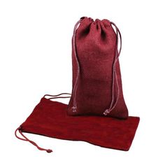 a red bag sitting on top of a red mat