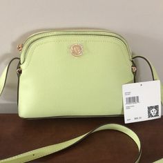 Trendy Beautiful Anne Klein Handbag Called “Hazel”. The Light Green Color They Call “Celery” Fits Perfect ! Inside Has Its Beautiful Signature Linings. Also Has A Zippered Pocket And Credit Card Holders. Outside Has A Slide Pocket On Front Side Handy For Your Cell Phone. The Nice Color And Gold Hardware Really Go Good Together! Nwt Measures 9” X 6” X 3”. Great Spring Bag! Green Pouch Bag With Gold-tone Hardware, Cross Body Satchel, Brown Crossbody Purse, Snakeskin Purse, Pink Crossbody Bag, Black Crossbody Purse, Spring Bags, Satchel Purse, Black Purses