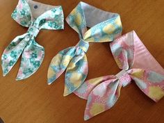 four different types of hair bows on a table