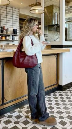 🔗visit for red bag of your dreams! ✨🍓 How to wear ugg boots in 2024, Red bag outfits, a cute little red bag, how to elevate a fall outfit, fall outfit accessories, red purse, red purse outfit, fall fashion trends, fall wardrobe, basic fall wardrobe, simple fall outfits, uggs with jeans outfits Cozy Picnic Outfit, Autumn London Fashion, Dream Bag Aesthetic, Going Out Outfit Cold Weather, London Outfits Autumn, Outfit Ideas Salon, Style My Closet, Orange Accent Outfit, Red Hobo Bag Outfit