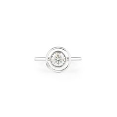 a white gold ring with a diamond in the center