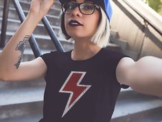 A personal favorite from my Etsy shop https://www.etsy.com/listing/603634908/lightning-bolt-lightning-bolt-shirt Wiccan Shirt, Hairstyle Black, Satanic Shirt, Girl Power Shirt, Goth Shirt, Tshirt Outfit, Black Lipstick, Taco Shirt, Feminist Shirt