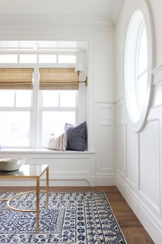 a room with white walls and wooden floors is featured on the instagram page for mapredee design