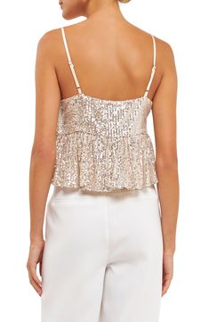 Shimmering sequins catch the light on a glamorous camisole fashioned with a sweetheart neck and ruffled peplum hem. Sweetheart neck Sleeveless Lined 100% polyester Hand wash, dry flat Imported Chic Party Camisole With Sweetheart Neckline, Chic Camisole With Sweetheart Neckline For Parties, Spring Party Camisole With Sweetheart Neckline, Summer Party Tank Top With Sweetheart Neckline, Elegant Sequin Cami Top, Glamorous Sequined Spaghetti Strap Tops, Party Embellished Spaghetti Strap Camisole, Elegant Embellished Camisole For Party, Elegant Sequined Cami Tank Top